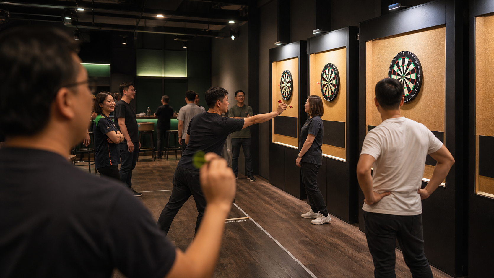 Adult players during a social darts night in a contemporary venue.